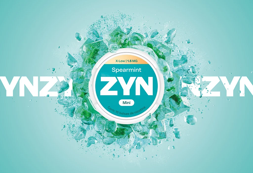  Lata mini de ZYN Spearmint verde de 1,5 mg, con explosion de hielo verde sobre el logotipo de ZYN.