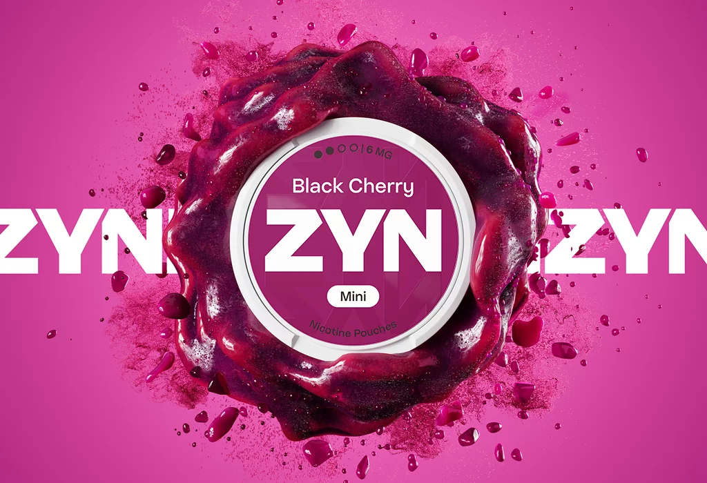 ZYN Black Cherry X-Low Mini nicotine pouches 6 mg on a cherry-inspired background
