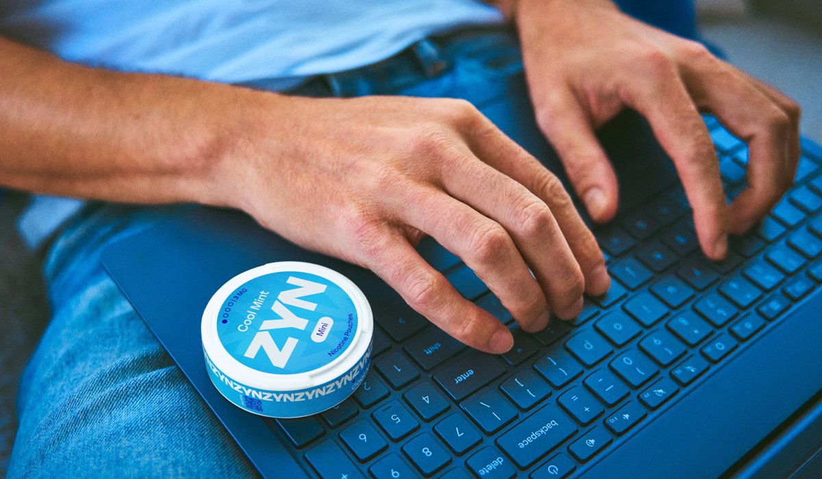 Man typing on the laptop, ilustration of what is ZYN news