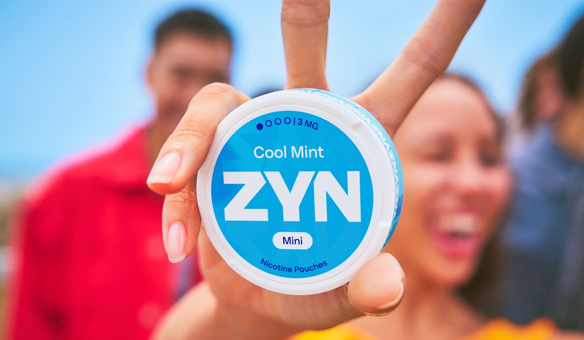 Girl holding blue ZYN can, ilustration of ZYN is a part of PMI portfolio news