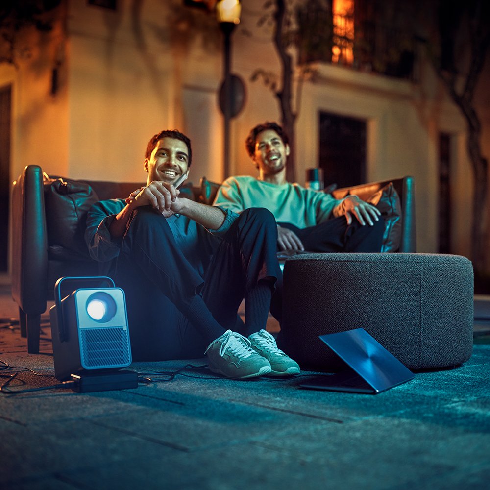 Two friends holding IQOS devices
