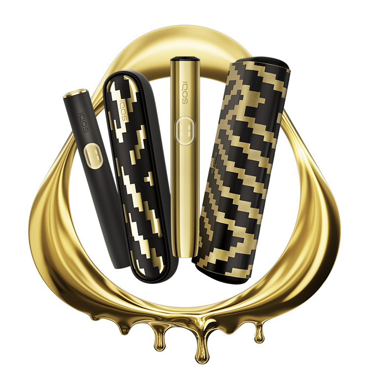 Zlaté zařízení IQOS v zlatém logu IQOS