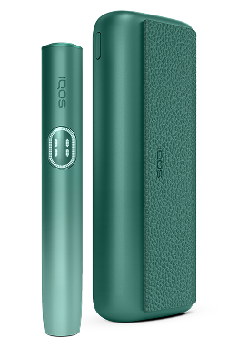 IQOS ILUMA i PRIME color verde con holder, sobre fondo verde claro.
