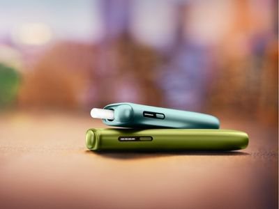two IQOS Iluma I One devices on table