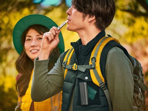 A pebble gray IQOS ILUMA device.