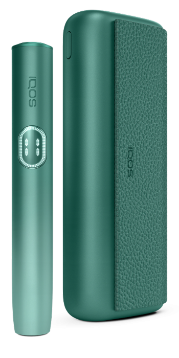 IQOS ILUMA i PRIME color verde con holder, sobre fondo verde claro.
