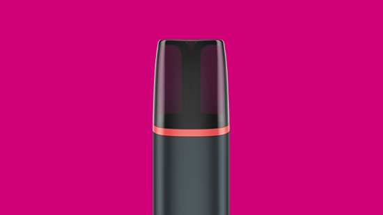 Close up of VEEV ONE vape on a pink background