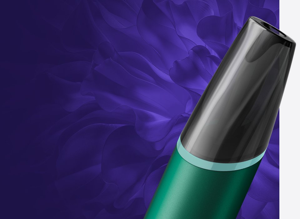 VEEV NOW ULTRA disposable vape close up of mouthpiece and green hardware 