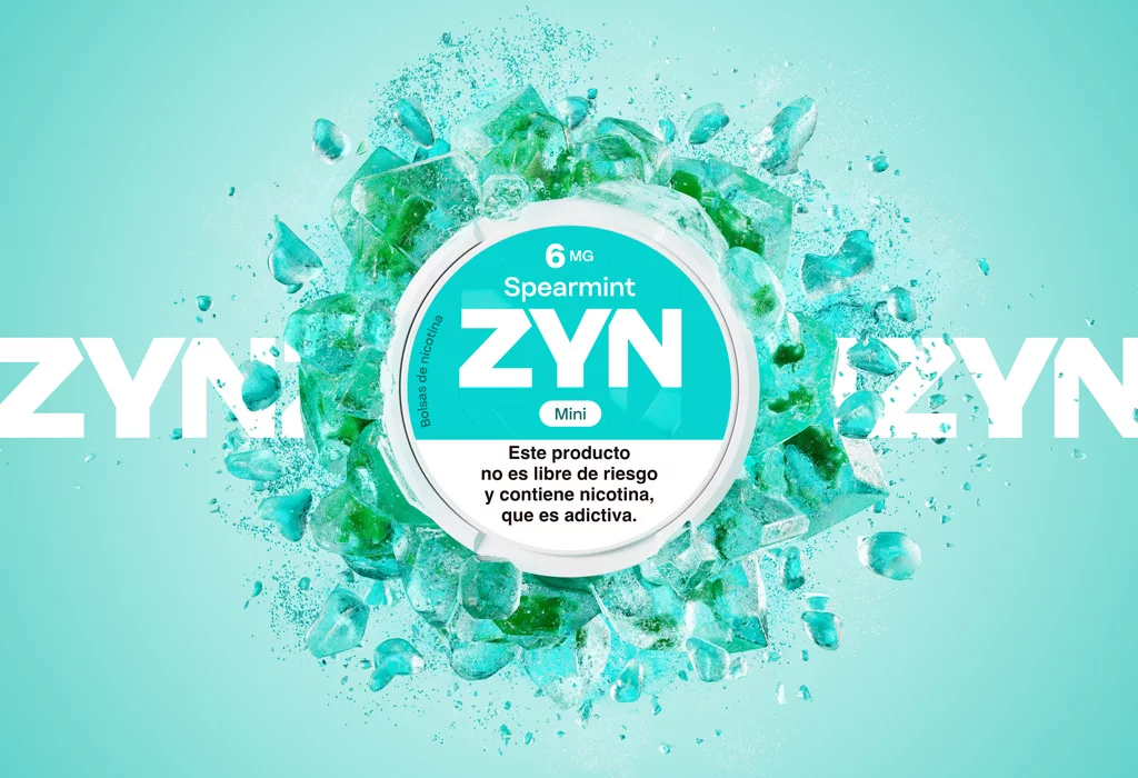  Lata mini de ZYN Spearmint verde de 6 mg, con explosion de hielo verde sobre el logotipo de ZYN.