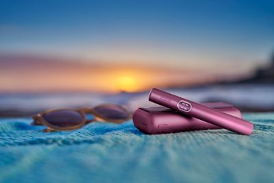 green ILUMA device on notepad