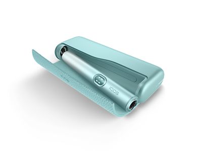 IQOS Iluma i turquesa con cargador pastel abierto en vista superior