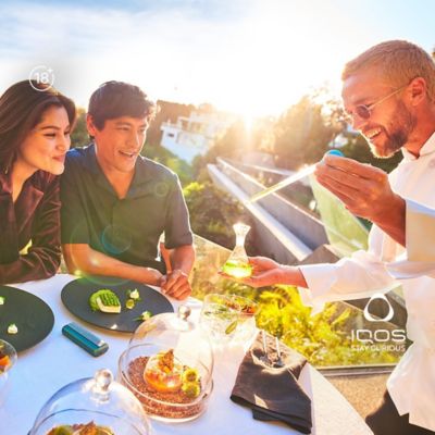 A group of friends bonding over food and drinks