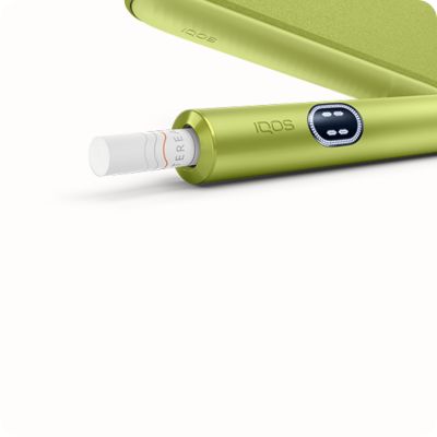 Detail zařízení IQOS ILUMA v zelené barvě