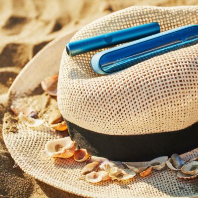 IQOS ILUMA zařízení na klobouku