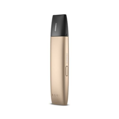 Brilliant gold IQOS VEEV device against a turqoise background