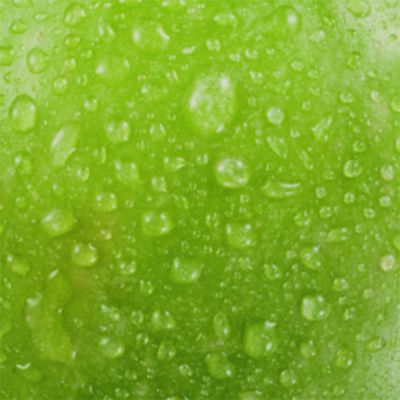 VEEV ONE náplně Sour Apple na zeleném pozadí