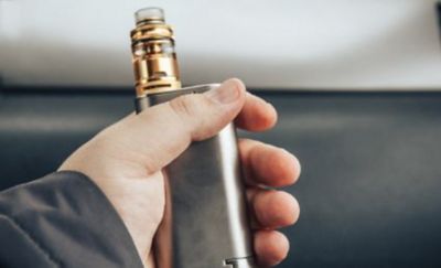 People blowing bubbles at a concert