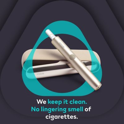 IQOS ILUMA device on the IQOS key logo with caption: We keep it clean. No lingering smell of cigarettes.