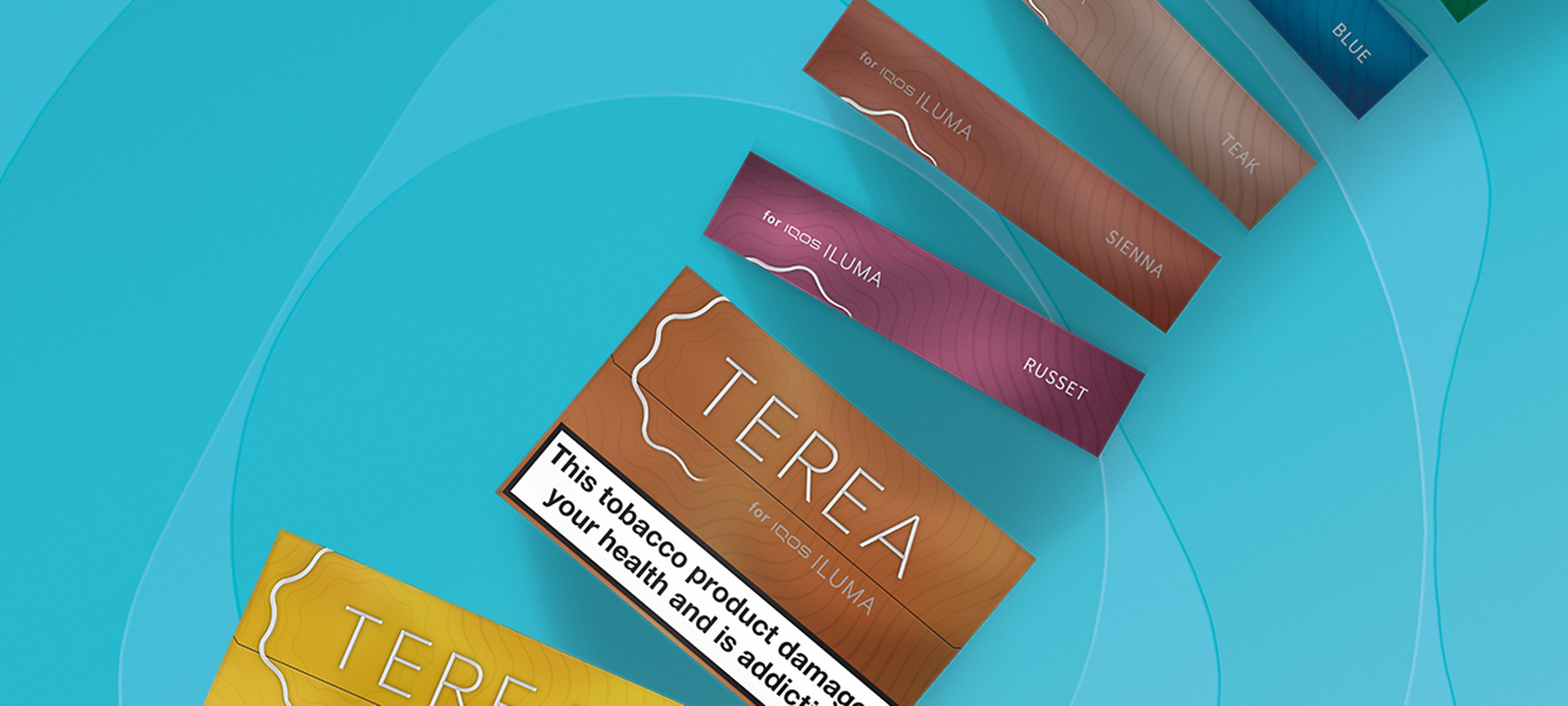 TEREA packs standing on a turquoise background, the packs include Amber, Russet, Sienna, Teak, Blue
