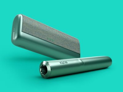 A Jade Green IQOS ILUMA PRIME Holder and Pocket Charger.