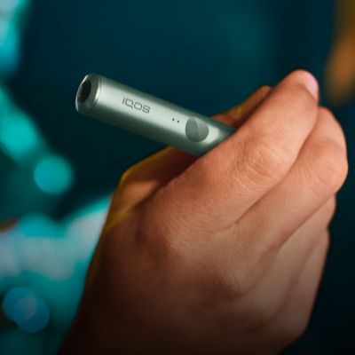 An Azure Blue IQOS ILUMA Holder. 