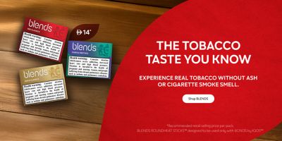 BLENDS Gold Classics, Red Classics, Green Classics and Silver Classics packs placed on dried tobacco leaves