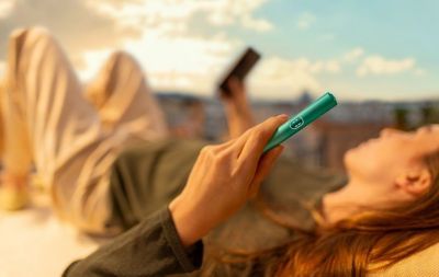 A TEREA stick in an IQOS ILUMA One held in hand