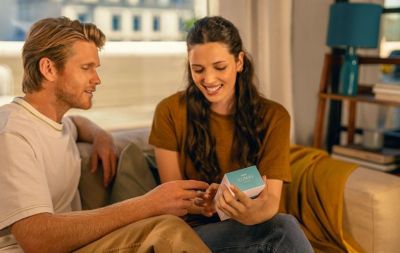 Can I charge IQOS from other electronic devices using the charging cable?