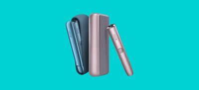 Un dispositivo IQOS Iluma Prime mostrando el holder y un IQOS Iluma uno junto al otro.