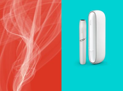 Lit cigarette end compared to IQOS HEETS stick in IQOS 3 DUO holder.