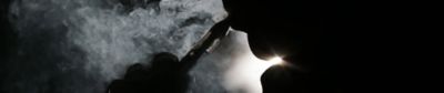 a person smoking heated tobacco