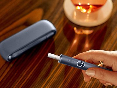 Midnight Black IQOS ILUMA i device and charger,