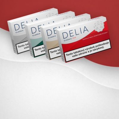 4 krabičky DELIA na bielo-červenom pozadí.