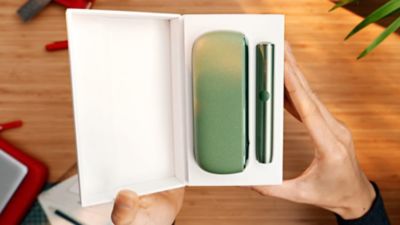 IQOS ILUMA en una caja