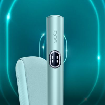 Breeze Blue IQOS Iluma i Holder and Charger on turqoise background
