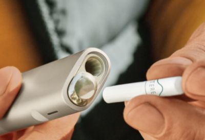 IQOS ILUMA ONE device with a TEREA stick.