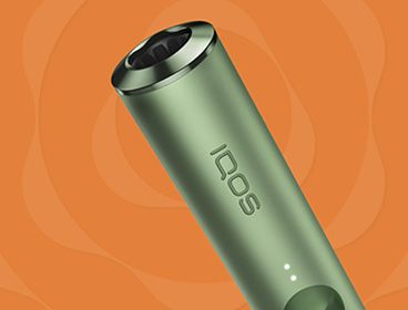 Un dispositivo IQOS ILUMA verde