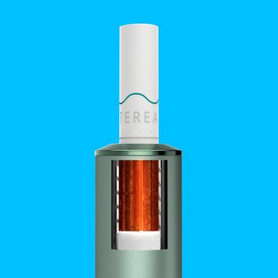 A Moss Green IQOS ILUMA with a TEREA stick inserted.