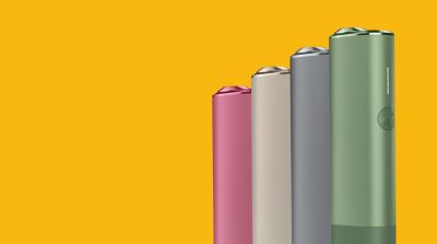 Un appareil IQOS ILUMA ONE de différentes couleurs.