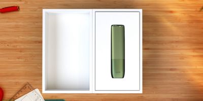Dispositivo IQOS ILUMA ONE en su caja