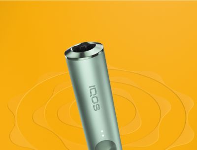 Un dispositivo IQOS ILUMA color Jade Green.
