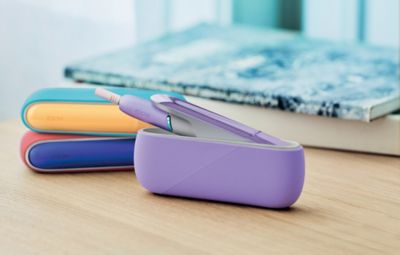 IQOS Originals Duo with purple cap and personalised pocket chargers.
