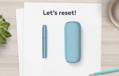 IQOS Originals ONE heated tobacco device in silver color.