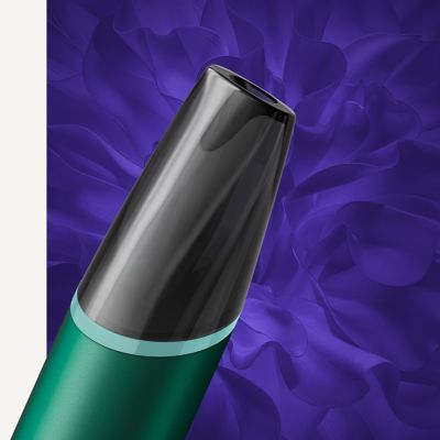 VEEV NOW black and green device on a violet background