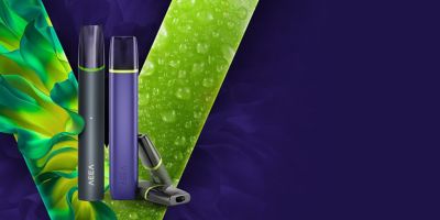 Two VEEV vaping devices on a red and orange V logo and violet background