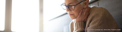 Woman sat down on smart tablet