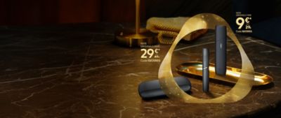 IQOS-Visual in Schwarz und Gold mit zwei Geräten und Preisen: ORIGINALS ONE für 9 €, DUO für 29 €, Code „IQOSREG“.