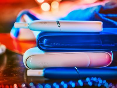 An IQOS device on a table.