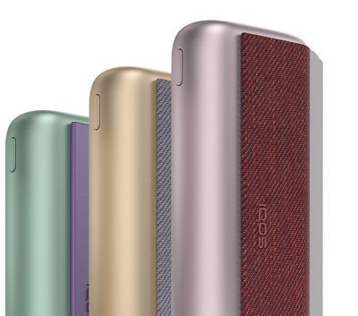 Tiga peranti IQOS ILUMA PRIME: jade green, gold khaki dan bronze taupe.