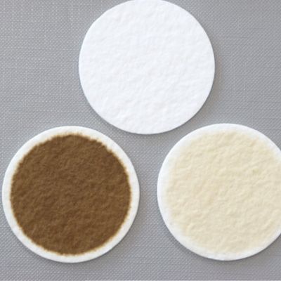 Representation of three filters, one pristine and the two others contaminated